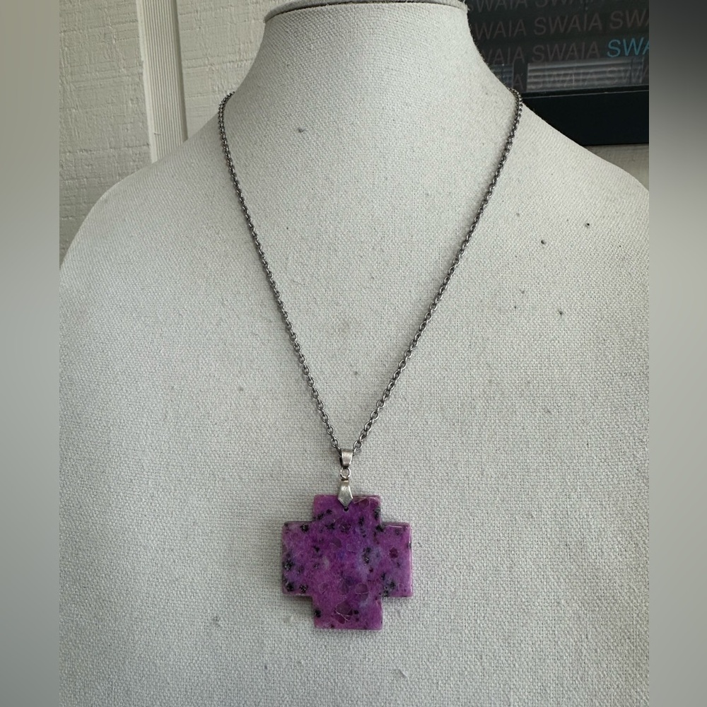 Heavy purple agate cross on a silvertone chain